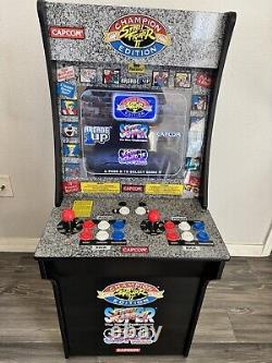 ARCADE1UP Street Fighter 3 in 1 Retro Video Game Cabinet with Riser