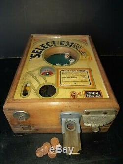 Antique Select'Em dice game coin machine, trade simulator 1933, slot machine