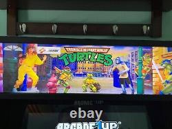 Arcade1Up Teenage Mutant Ninja Turtles Cabinet Machine with Riser & Light Up