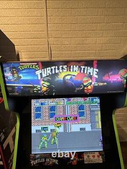 Arcade1Up Teenage Mutant Ninja Turtles w Riser, Light Up Marquee, Stool