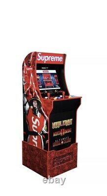 SUPREME MORTAL KOMBAT Arcade Machine By Arcade1UP IN HAND