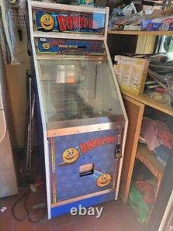 Jeu d'arcade Coin Pusher avec trou de bonus