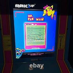 Machine d'arcade Arcade1Up Ms. Pac-Man avec socle surélevé et enseigne lumineuse (Modèle 8267)